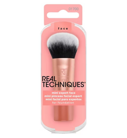 Real Techniques makeup brush in packaging on a white background