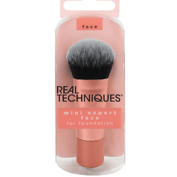 Real Techniques Mini Expert Face Brush in packaging, designed for flawless foundation application on-the-go.