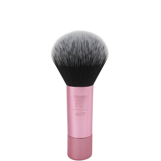 Real Techniques Mini Multitask Brush for flawless makeup application on the go, featuring soft synthetic bristles.