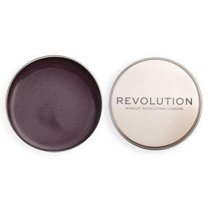 Makeup Revolution product with purple interior and beige exterior on a white background
