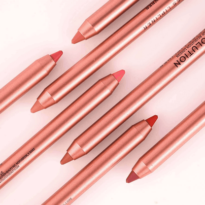 Revolution Set of rose gold lip liner pencils on a light pink background