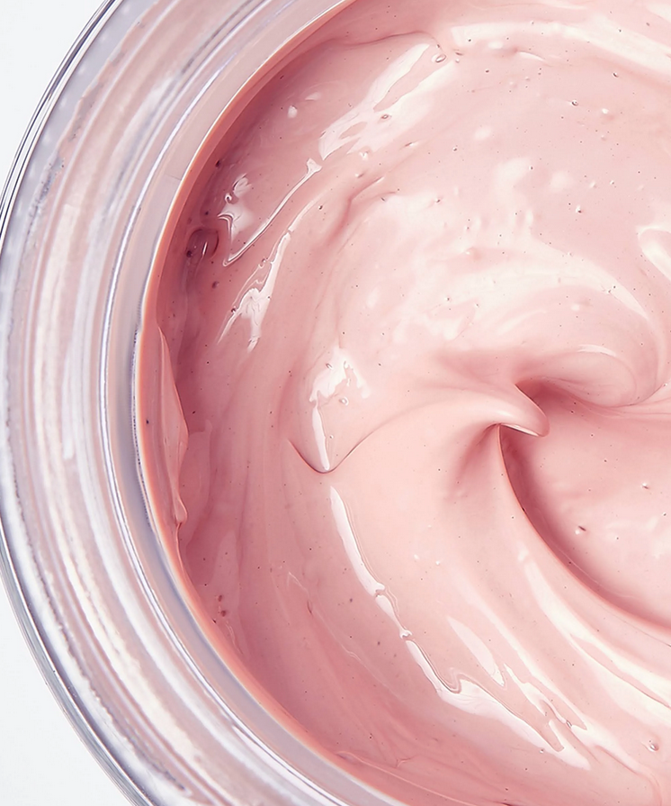 Revolution Close-up of pink cream in a jar