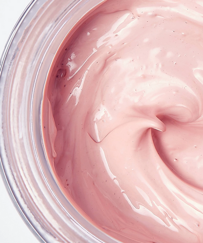 Revolution Close-up of pink cream in a jar