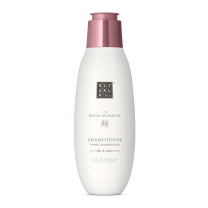 RITUALS The Ritual of Sakura Conditioner bottle for smooth, voluminous hair, infused with rice extract and macadamia oil.
