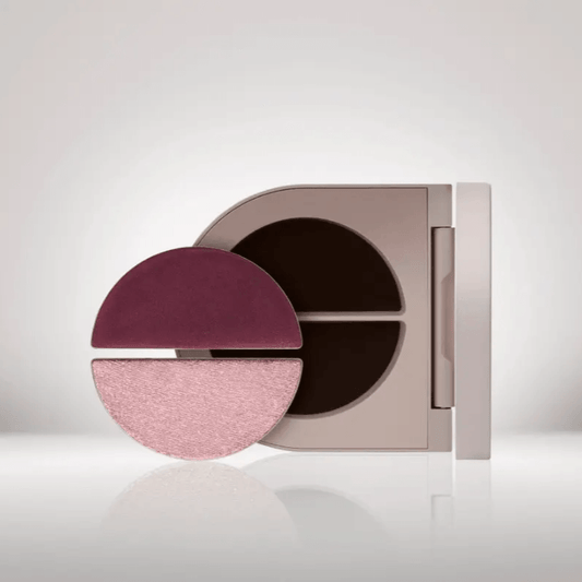 Rose Inc Satin & Shimmer Duet Eyeshadow in Satin Plum and Lavender Shimmer with sleek compact packaging.