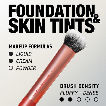 Makeup brush with foundation and skin tints information on a light gray background