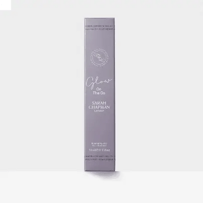 Sarah Chapman Glow On The Go Illuminating Elixir packaging, 10ml size, showcasing elegant design and brand logo.