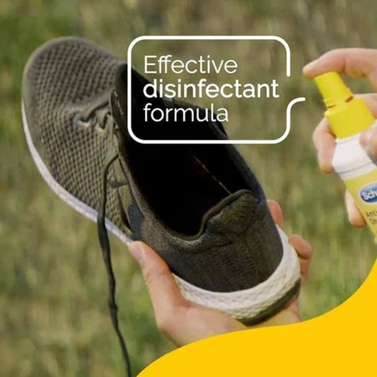 Scholl Antifungal Shoe Spray being applied to a sneaker for effective disinfectant protection against fungus.