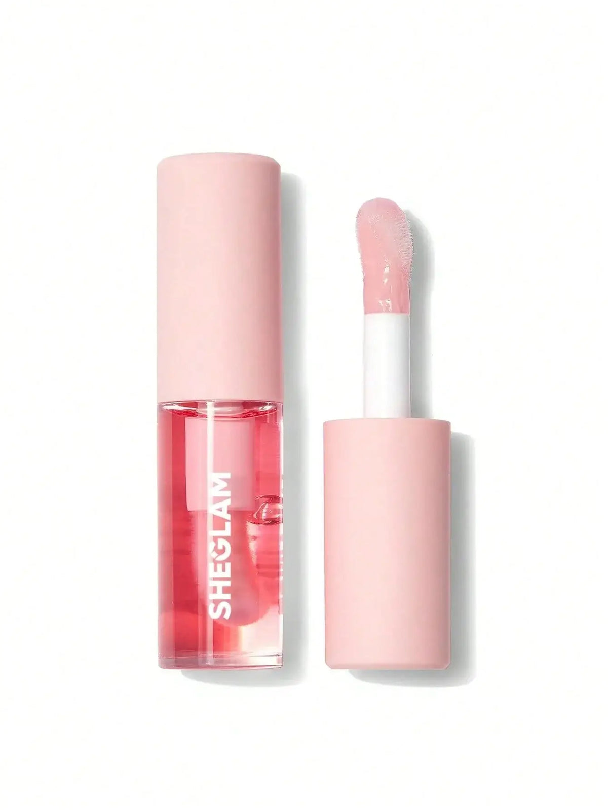 SHEGLAM Jelly Wow hydrating lip oil in pink packaging with doe-foot applicator for glossy, healthy lips.