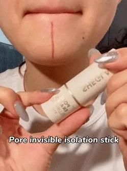 Person holding a pore invisible isolation stick, demonstrating its blurring effects on skin texture.