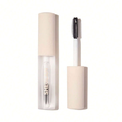 SHEGLAM Set Me Up Brow Gel in transparent packaging with a dual-ended brush for smooth, soft brows.
