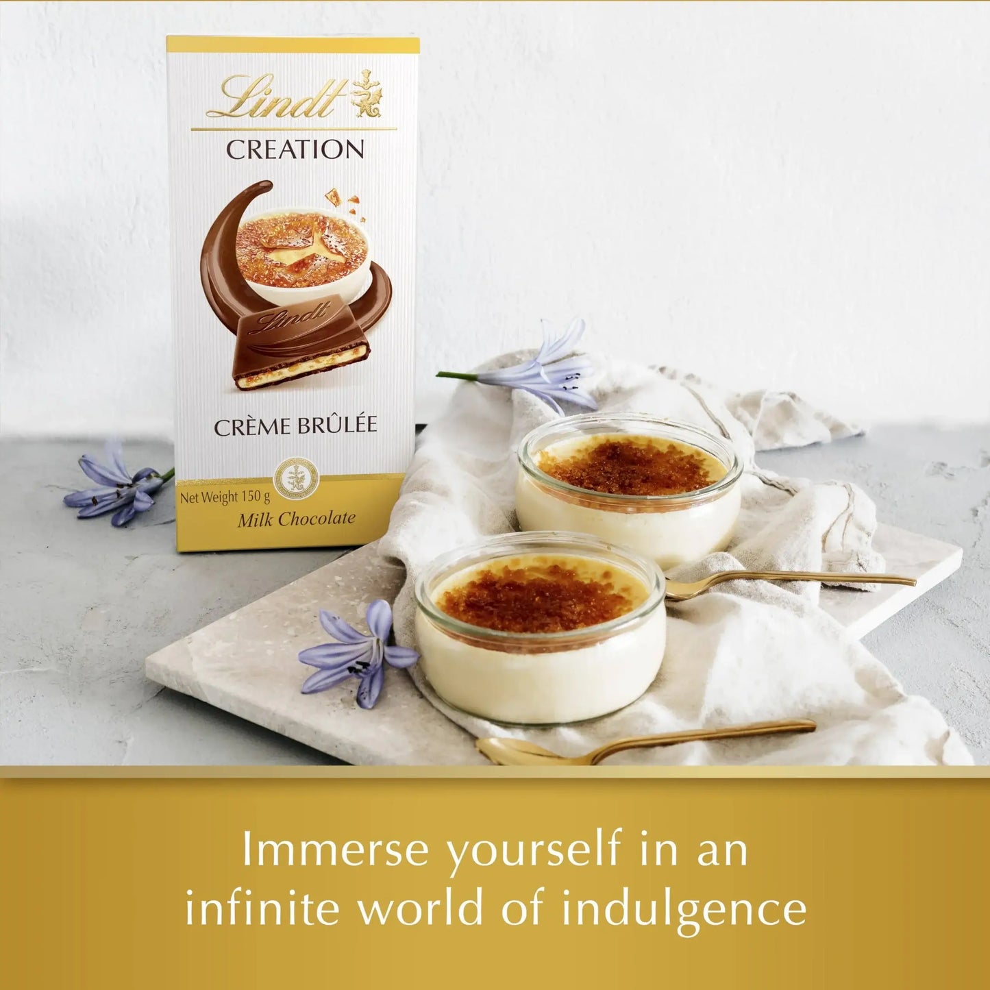 Lindt Creme Brélé packaging with two ramekins of dessert on a white surface.
