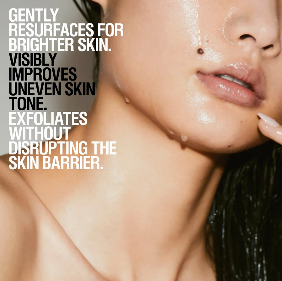 Close-up of a person's face with text about Grown Alchemist skincare benefits