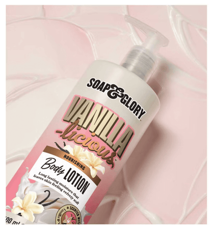 Soap & Glory Vanilla-licious body lotion bottle with creamy texture on a pink background, offering nourishing skin care.