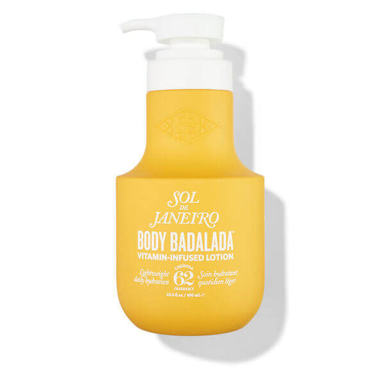 Sol de Janeiro Body Badalada™ Lotion 400ml in a yellow bottle, designed for silky hydration and nourishment.