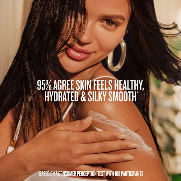 Model demonstrating the softness and hydration benefits of Sol de Janeiro Body Badalada™ Lotion on her skin.