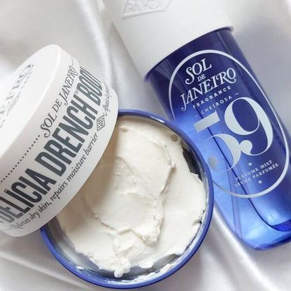 Sol de Janeiro Delicia Drench Body Butter and fragrance mist in blue packaging, luxurious skincare essentials.