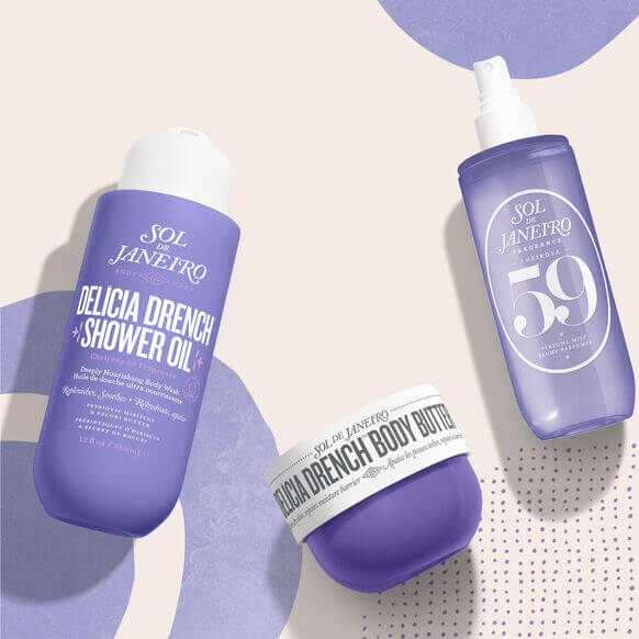 Sol de Janeiro Delicia Drench Shower Oil, Body Butter, and fragrance mist in beautiful purple packaging.