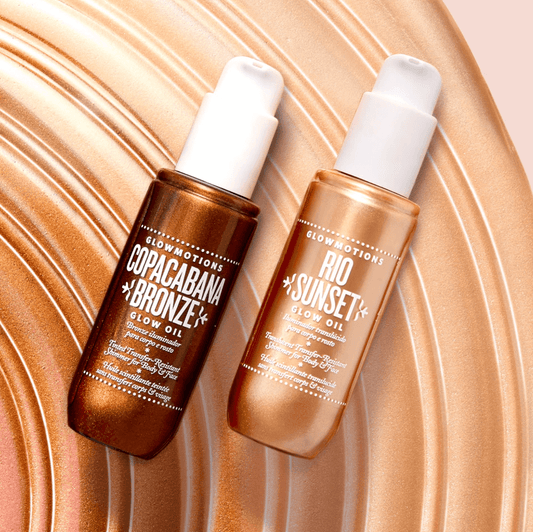 GlowMotions Copacabana Bronze and Rio Sunset Glow Oils on a shimmering background, highlighting their sun-kissed sheen.