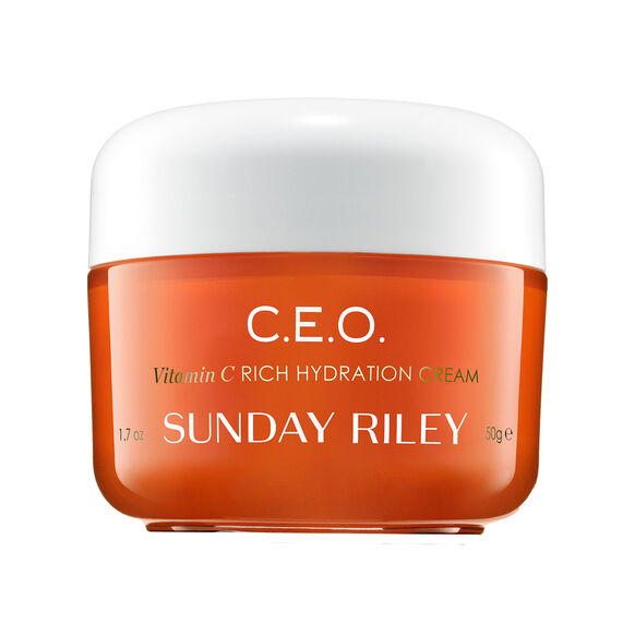 Orange jar of C.E.O. Vitamin C Rich Hydration Cream by Sunday Riley on a white background