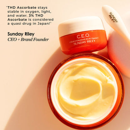 Sunday Riley C.E.O. Vitamin C Rich Hydration Cream inside jar with product lid and spatula.