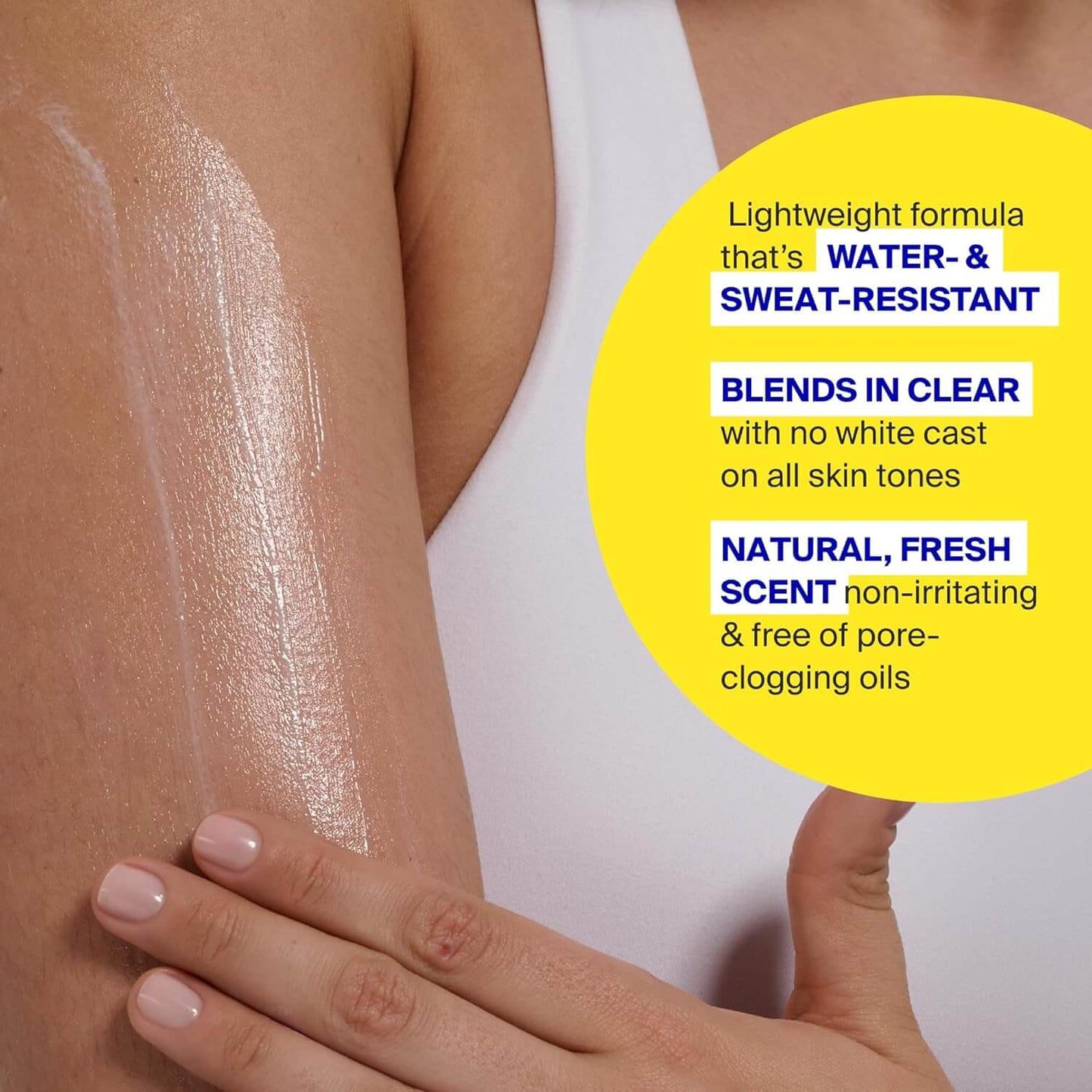 Supergoop Sunscreen application on arm with product features highlighted
