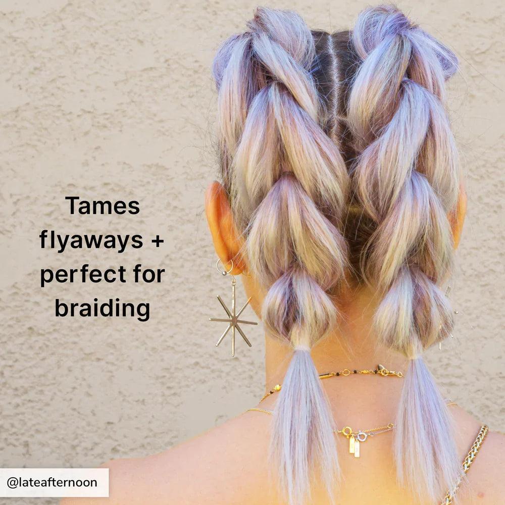 color wow Close-up of a braided hairstyle featuring pastel colors, showcasing flyaway control and braiding perfection.  