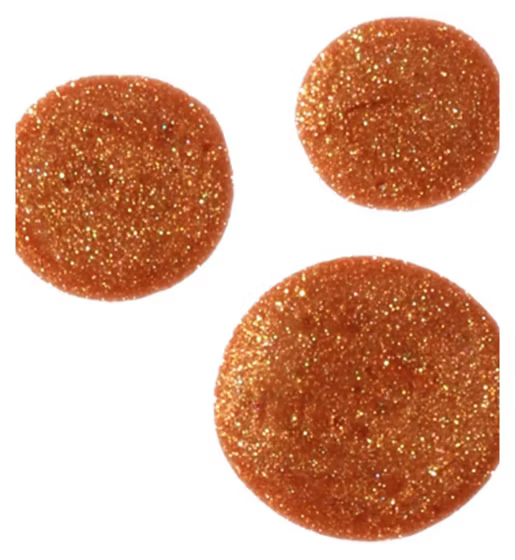 Ted Baker Three round, glittery orange objects on a white background