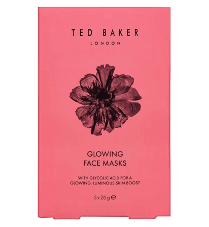 Ted Baker Glowing Face Masks package featuring floral design, promotes luminous skin with glycolic acid, 3 x 26g.