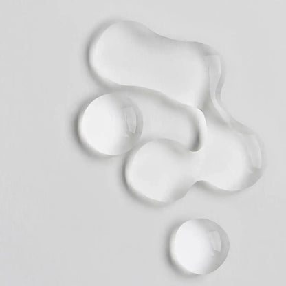 Close-up of clear gel drops representing The INKEY List Collagen Peptide Serum's lightweight formula.