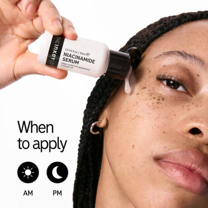 Woman applying The INKEY List Niacinamide Serum, demonstrating usage for clear skin, morning and night.