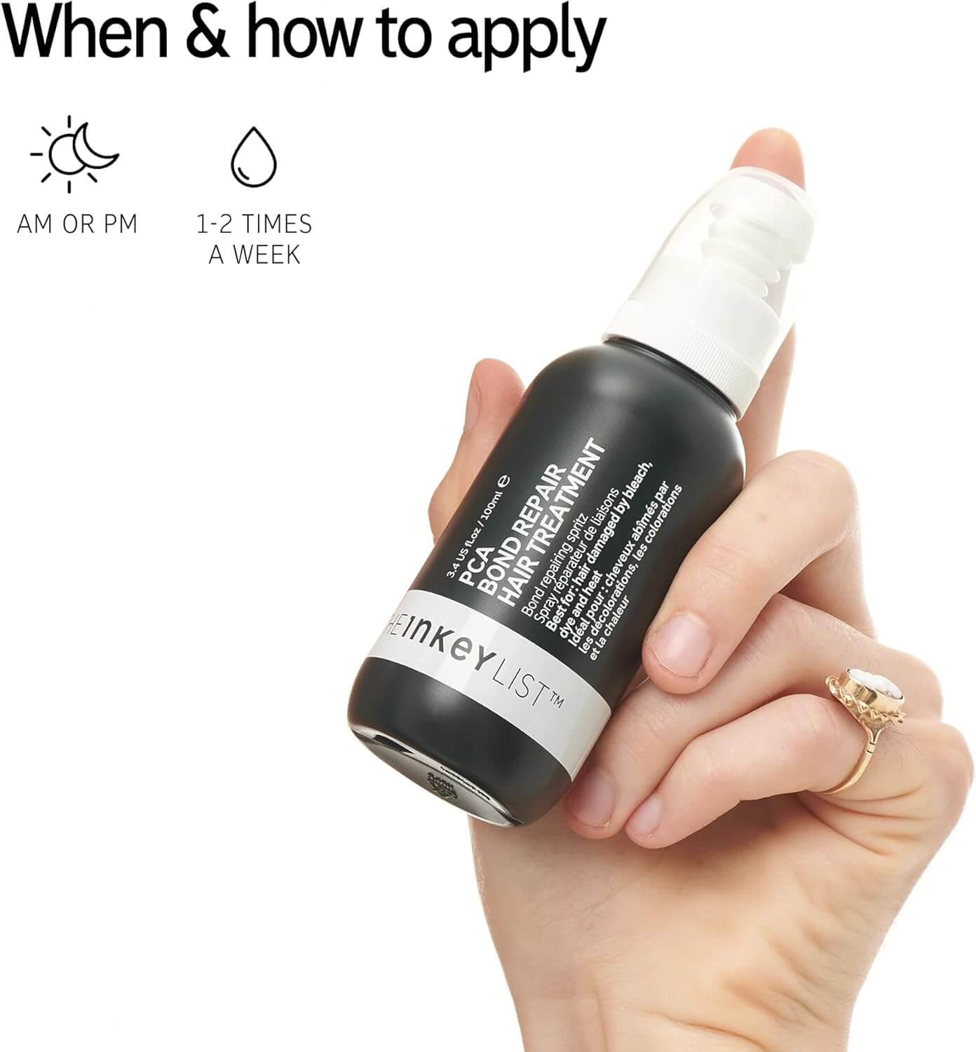 The INKEY List PCA Bond Repair Hair Treatment bottle held in hand, showcasing application instructions and usage frequency.