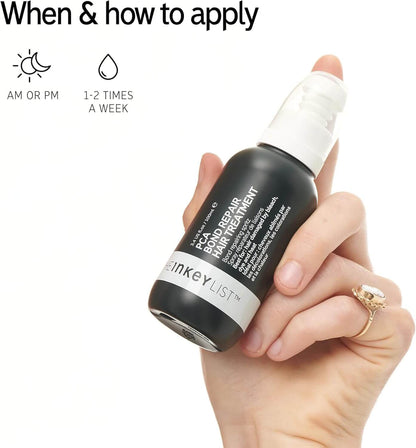 The INKEY List PCA Bond Repair Hair Treatment bottle held in hand, showcasing application instructions and usage frequency.