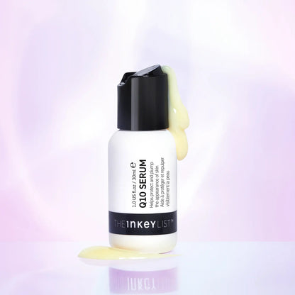 The INKEY List Q10 Serum 30ml bottle with serum dripping, designed for youthful and hydrated skin.