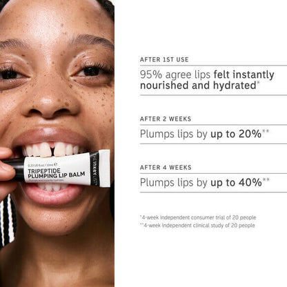 Woman showcasing The INKEY List Tripeptide Plumping Lip Balm and its hydration benefits.