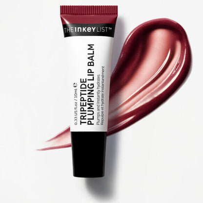 The INKEY List Tripeptide Plumping Lip Balm 10ml tube with a burgundy smear, enhancing lip volume and hydration.