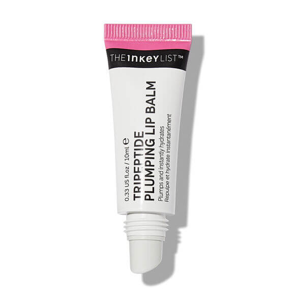 The INKEY List Tripeptide Plumping Lip Balm 10ml tube for hydrated, fuller lips, with pink and white packaging.
