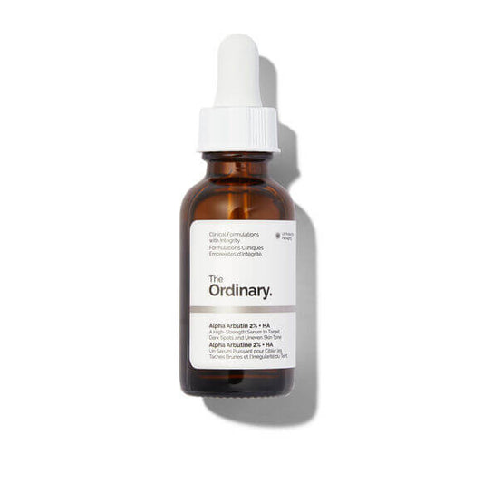 The Ordinary Alpha Arbutin 2% + HA serum in a brown glass bottle with dropper for bright, radiant skin.