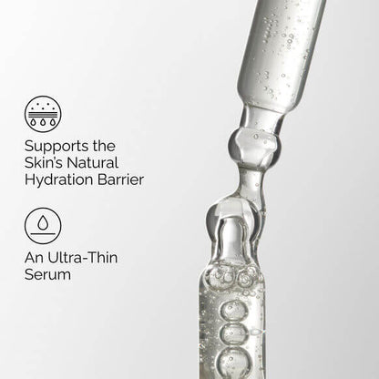 Close-up of an ampoule with text about supporting the skin's natural hydration barrier.