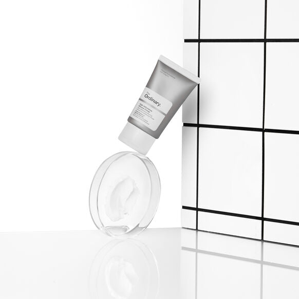 The Ordinary Skincare product with a grid background