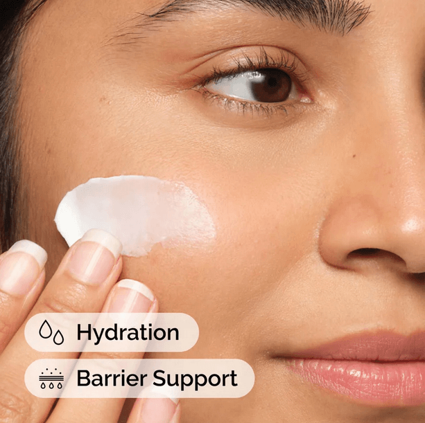 Close-up of a woman applying The Ordinary Natural Moisturising Factors + HA for deep hydration and skin barrier support.