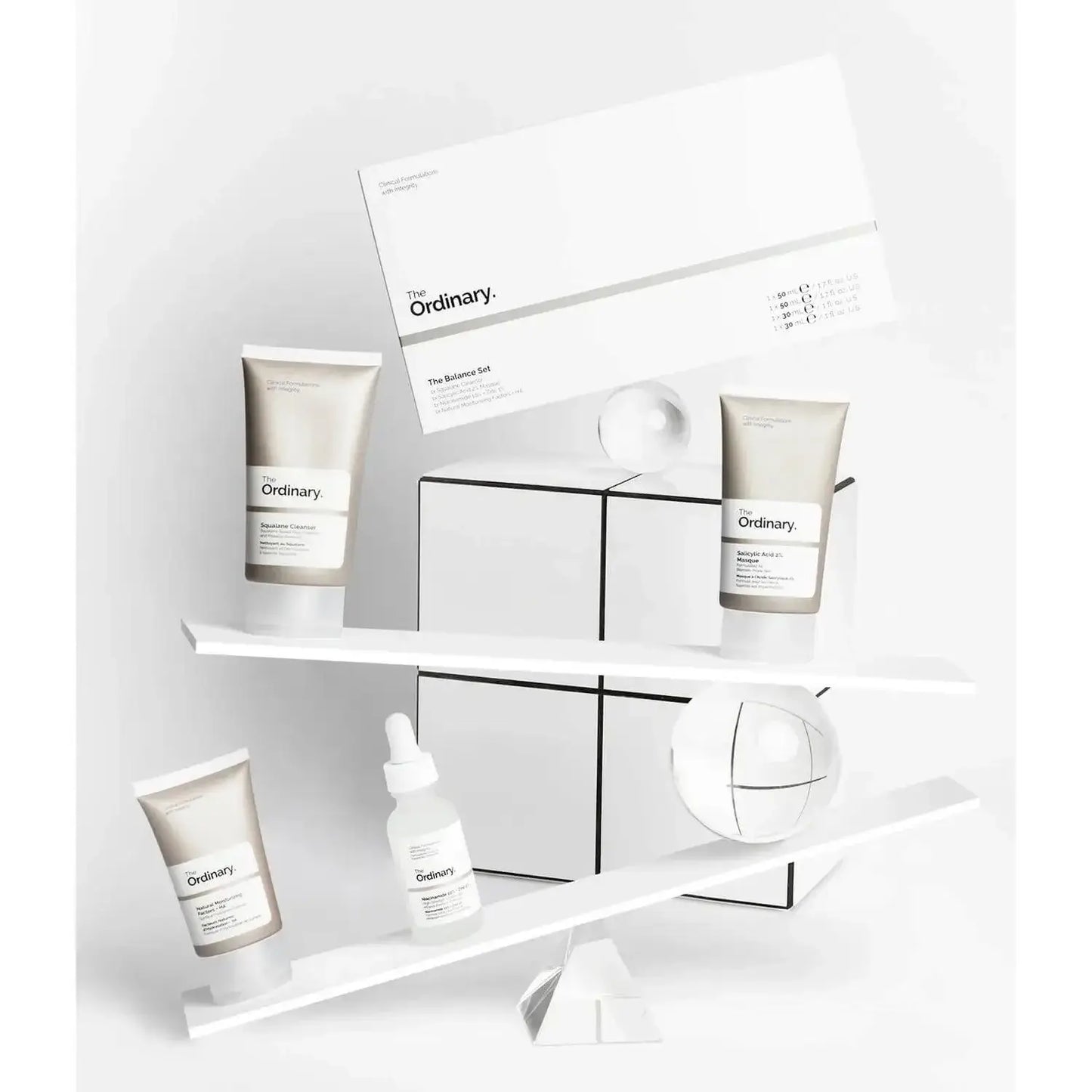 The Ordinary The Balance Set featuring four skincare products on a minimalist display for a balanced complexion.
