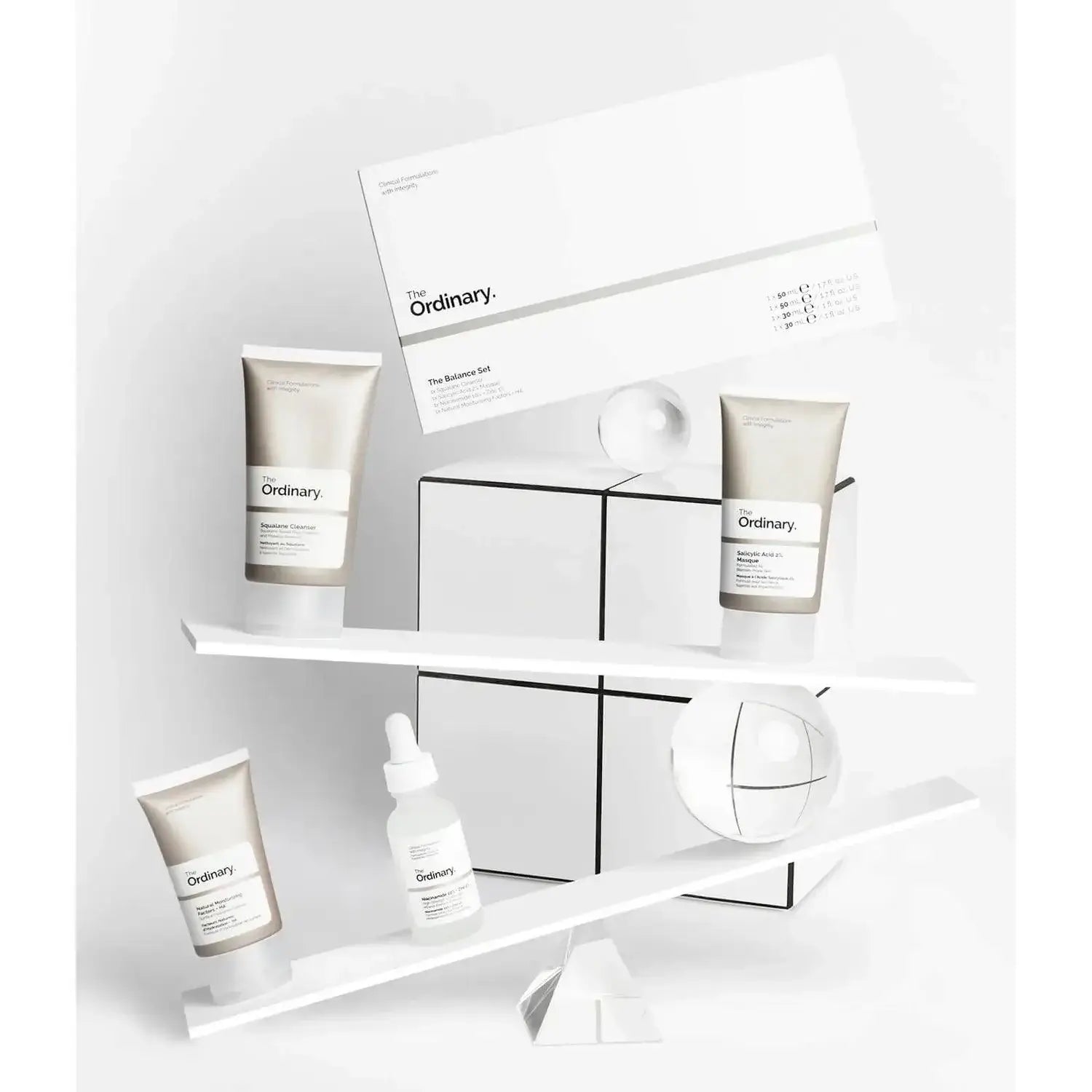 The Ordinary The Balance Set featuring four skincare products on a minimalist display for a balanced complexion.