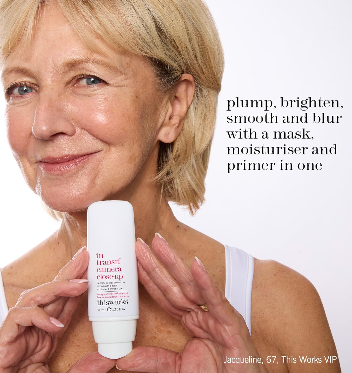 Woman holding a thisworks skincare product with text about skincare benefits on a white background