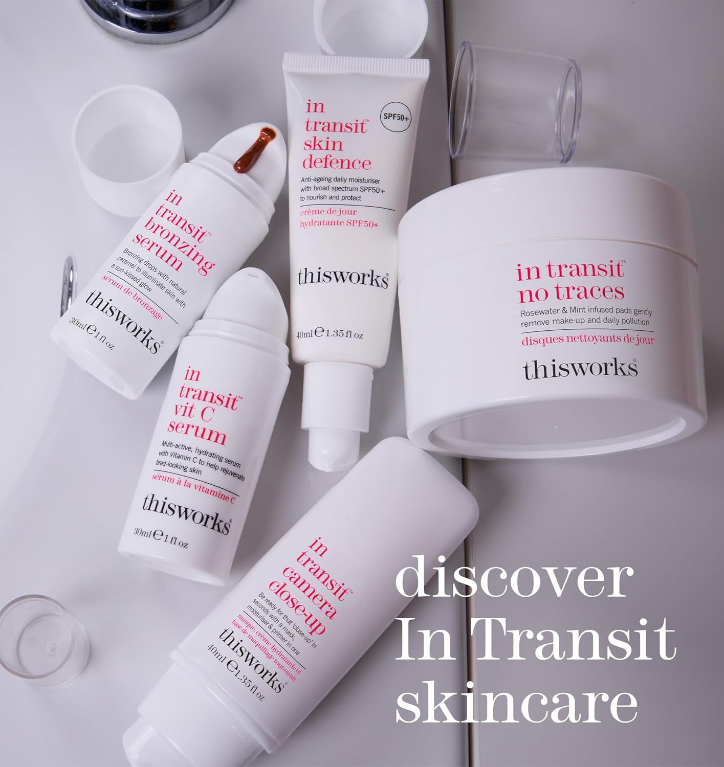 thisworks skincare products for flawless skin, including In Transit series, displayed on a stylish vanity.