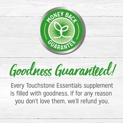 Touchstone Essentials Money Back Guarantee badge with text "Goodness Guaranteed" on a wooden background.