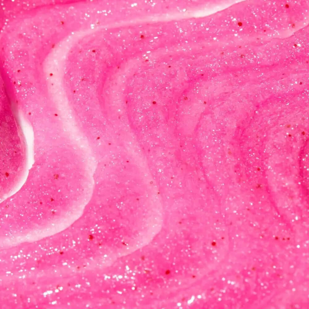 Close-up of TREE HUT Cotton Candy Sugar Scrub showing its vibrant pink and glittery texture for smoother skin.