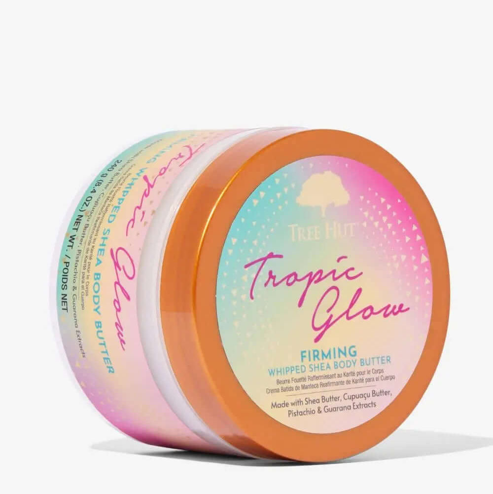 Tree Hut Whipped Body Butter Tropic Glow 240g in colorful packaging, designed for hydration and skin nourishment.