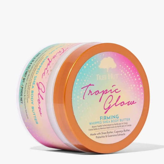 Tree Hut Whipped Body Butter Tropic Glow 240g in colorful packaging, designed for hydration and skin nourishment.