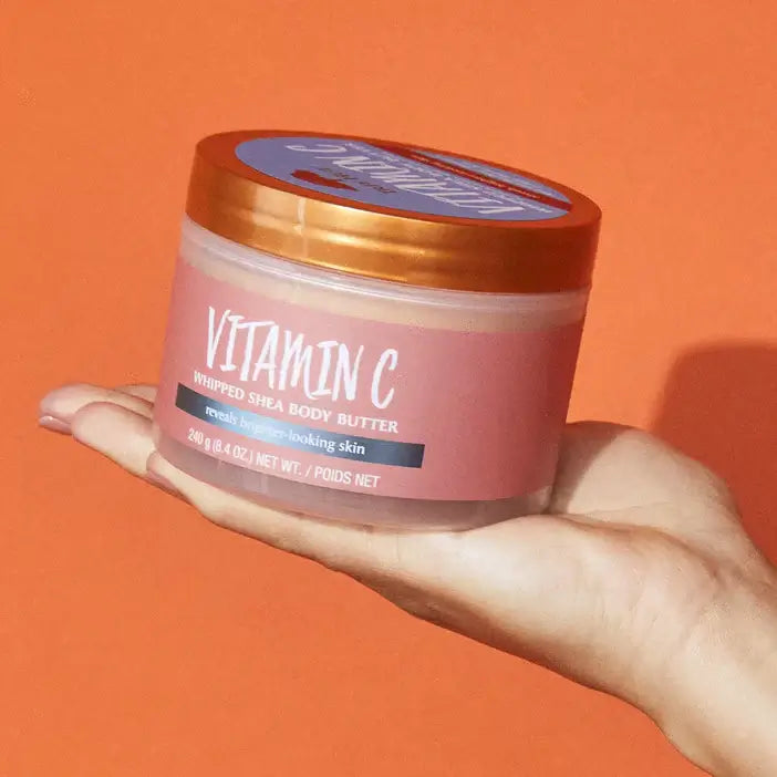 TREE HUT Whipped Body Butter Vitamin C in hand, showcasing its radiant skincare benefits.